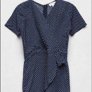 navy blue and white polka dot romper